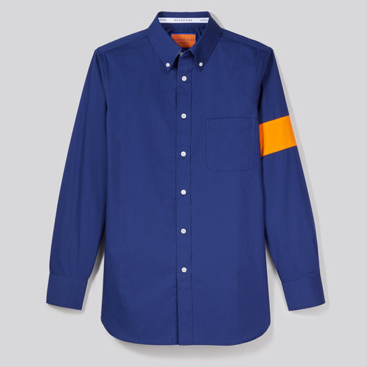 Our signature fall button down is made from cotton and remains neat beneath a sweater.
