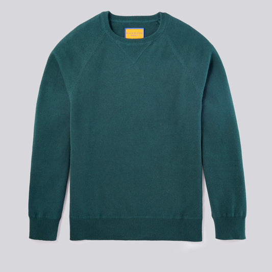 This forest green sweater is an elevated basic that is perfect for the fall. Made from soft loopback cotton knit in a comfortable fit and has a classic crewneck.